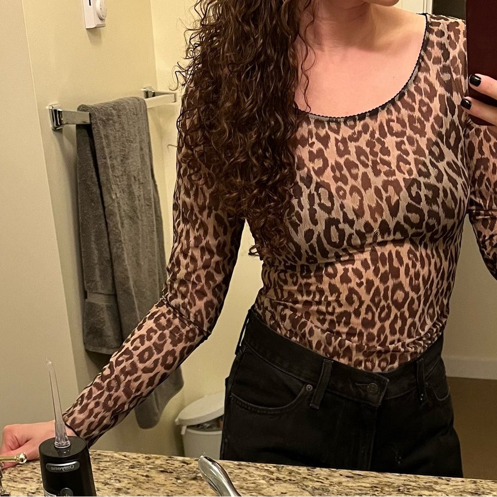 Dolce & Gabanna Vintage Leopard Print Sheer Top, perfect for autumn layering